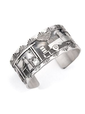 SILVER STORYTELLER CUFF BRACELET BY ROLAND BEGAY (NAVAJO)