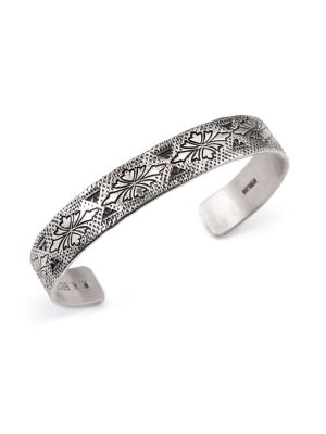 SILVER STAMPED CUFF BRACELET BY ROLAND BEGAY (NAVAJO)
