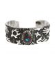 PETROGLYPH BRACELET WITH TURQUOISE BY KEE YAZZIE (NAVAJO)