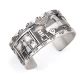 SILVER STORYTELLER CUFF BRACELET BY ROLAND BEGAY (NAVAJO)