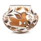 Floral parrot pottery bowl by Delores Juanico (Acoma)